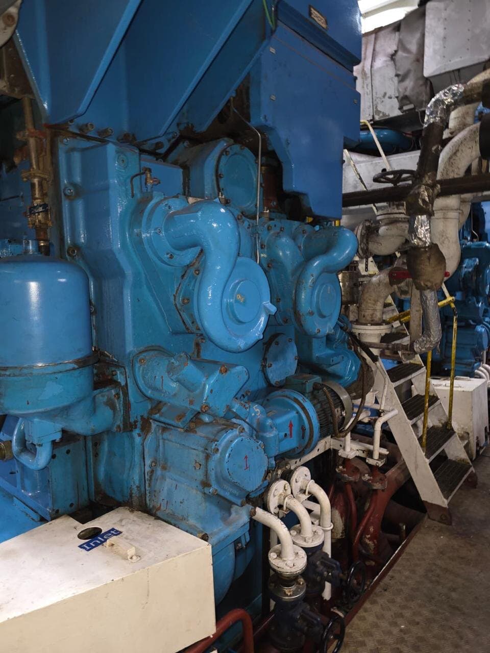 Blue Wartsila 8L32 diesel engine assembly